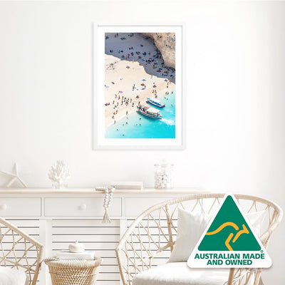 Framed aerial photo of boat visiting a beach in the Greek Islands