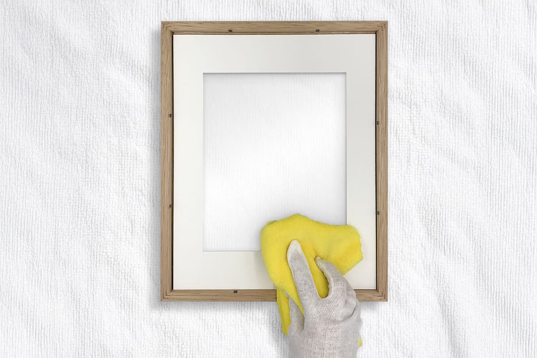 Cleaning the inside glass of a photo frame