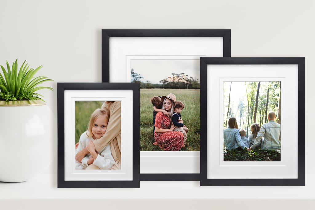 black-photo-frames-on-shelf