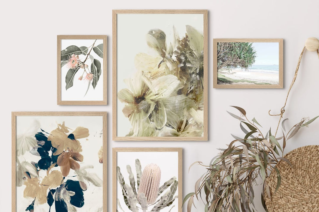 Wall with framed floral prints and a woven basket by Profile Australia