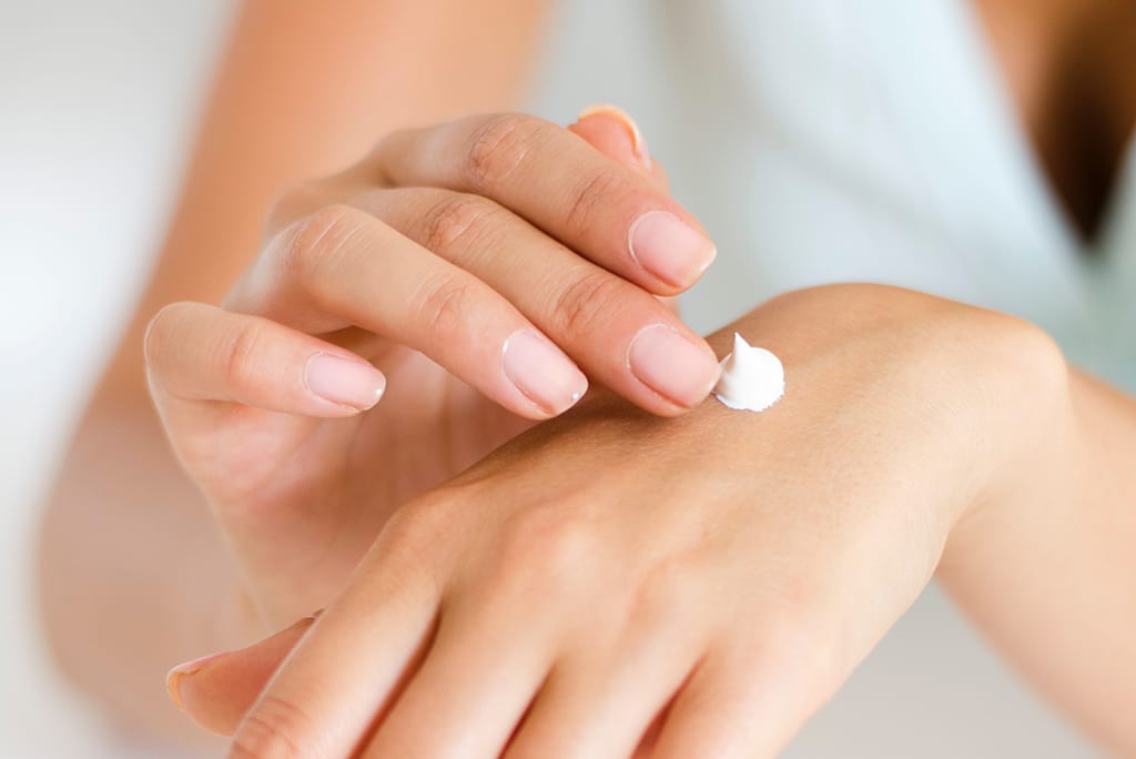 Hand Cream being Applied to hands