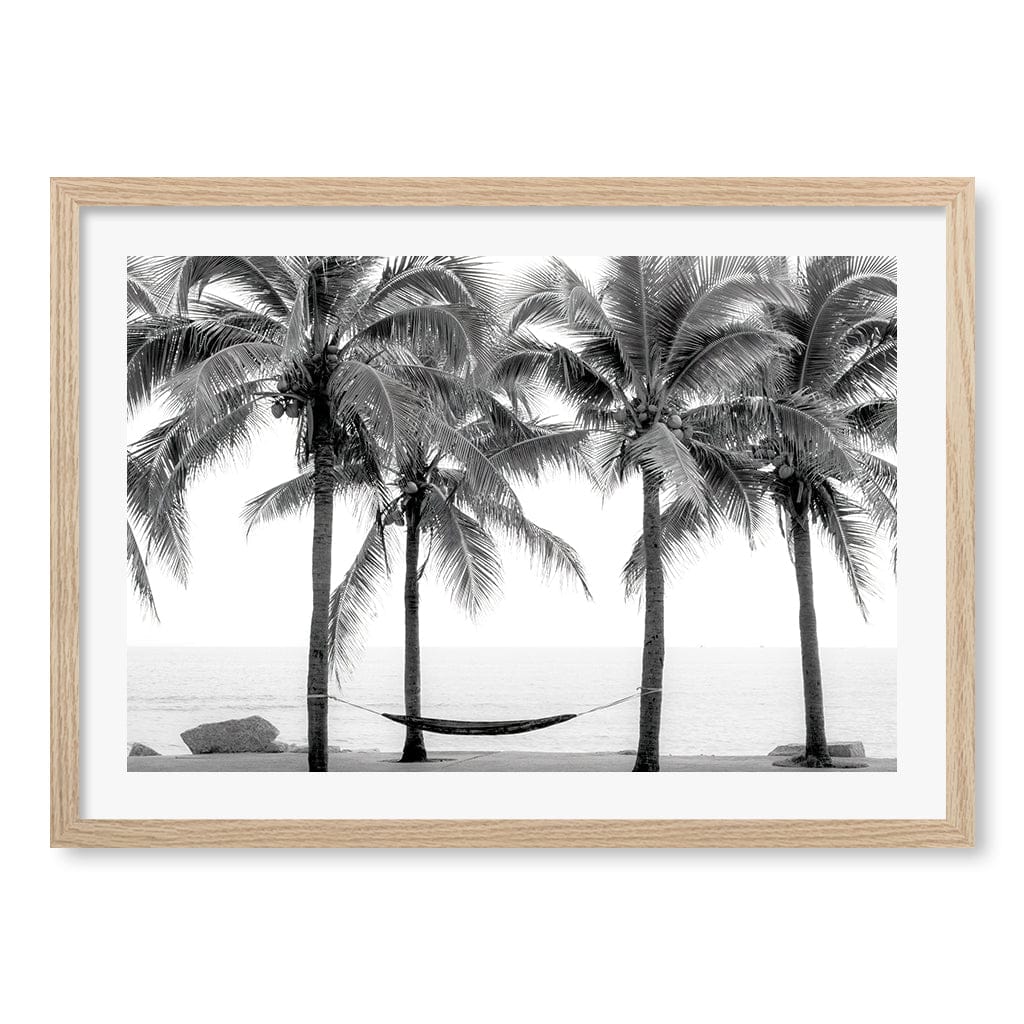 Hammock and Palms B&W Wall Art Print A2 (42 x 59.4cm) / Natural Oak Frame / White Border from our Australian Made Framed Wall Art, Prints & Posters collection by Profile Products (Australia) Pty Ltd