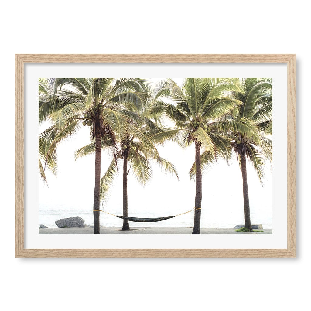Hammock and Palms Wall Art Print A2 (42 x 59.4cm) / Natural Oak Frame / White Border from our Australian Made Framed Wall Art, Prints & Posters collection by Profile Products (Australia) Pty Ltd