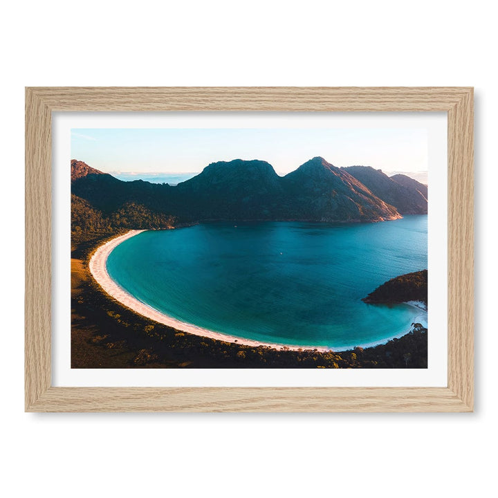 Wineglass Bay Wall Art Print A4 (21 x 29.7cm) / Natural Oak Frame / White Border from our Australian Made Framed Wall Art, Prints & Posters collection by Profile Products (Australia) Pty Ltd